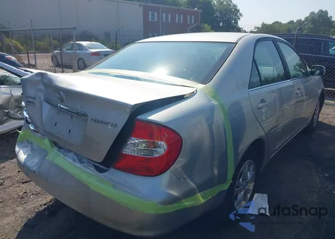 2002 Toyota Camry Le from USA, damaged, VIN 4T1BE32K42U504553